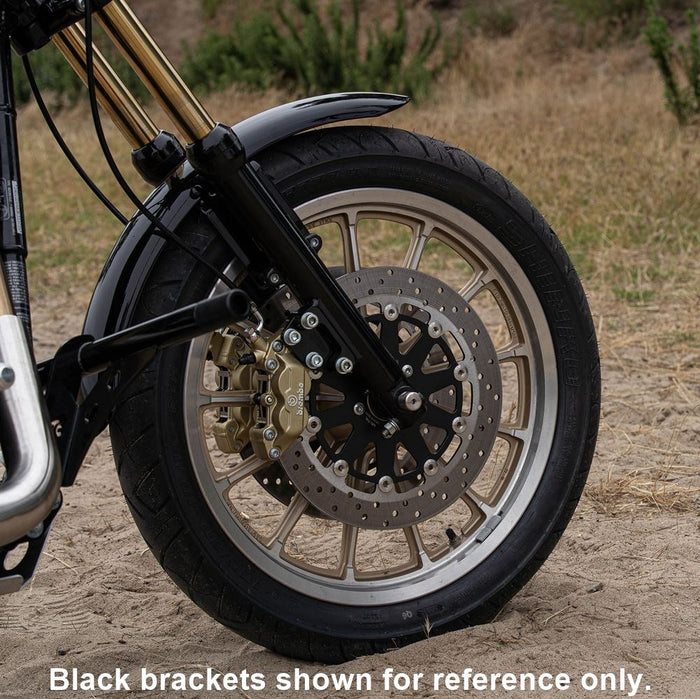 A TC Bros. Axial Brembo Front RH Bracket for 2000-2017 Harley Stock Rotors with three pre-drilled holes is displayed alongside four bolts and four washers.