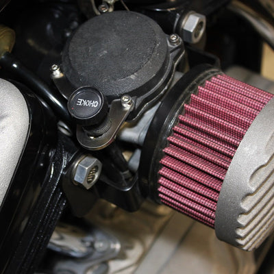 A close up of the TC Bros. Choke Relocation Kit for Harley Davidson CV Carburetors, the highest quality air filter on a motorcycle.