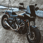 The TC Bros. Sissy Bar for 2018-Up Harley-Davidson Fat Bob, shown installed and separately against a white background, includes mounting hardware for easy bolt-on installation. Brand: TC Bros.