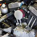 The TC Bros. Air Cleaner for Harley-Davidson Bendix, Zenith, and Keihin Butterfly Carburetors features red pleated fabric and a ribbed silver metal cap. This round cleaner by TC Bros. is shown against a white background.
