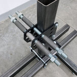 A DIY Motorcycle Frame Jig Kit by Chop Source (Great for Chopper and Bobber Frame Building) with two structural tubing bolts on it.