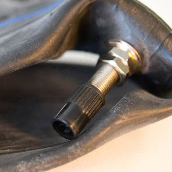 A Sedona Front Inner Tube 3.25/3.5-19 with a threaded metal valve stem attached to it.