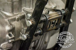 A set of Hughs HandBuilt XS650 Motor Mount Kit (74-Up) bolts, nuts, and washers for a motorcycle chassis.
