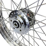A close-up of the Mid-USA Chrome 40 Spoke Front 19"x2.5" Wheel for Harley Ironhead Sportster XL 1978-1983, featuring a central hub, set against a white background.