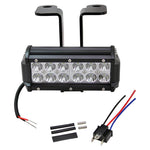 The TC Bros. Scrambler LED Headlight Kit for Harley-Davidson includes two black LED light bars with wiring, connectors, brackets, and hardware—perfect for off-road use or upgrading your Harley's lighting system.
