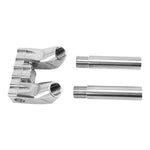 Four TC Bros. Pro Series Modular Pullback Risers for Harley-Davidson, in black and silver finishes, stand upright in two rows against a white background.