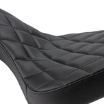 A close up of a TC Bros. Hardtail Rigid Cobra Seat Black Diamond.