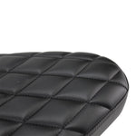 A close up of a TC Bros. Hardtail Rigid Mount Solo Seat Black Diamond chopper solo seat with diamond stitching style.