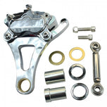 A Moto Iron® Left Side Springer Brake Caliper Kit in chrome, including bolts, washers, spacers, and a linkage rod, is displayed on a white background.