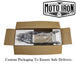 Two Moto Iron® Springer Front Ends for Harley-Davidson frames with 1" necks—one chrome, one black—are displayed side by side with a metal rod and two small parts. Ideal for custom Harley-Davidson springer setups.