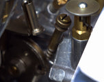 A close up of a Pangor Cycles All Thumbs Idle Speed Screw For S&S Super E / G Carburetor - Brass made in USA.