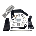 TC Bros. Mid Controls Kit for 1991-2017 Harley-Davidson Dyna by TC Bros., featuring assorted CNC-machined black metal brackets, springs, bolts, nuts, washers, and rod components arranged on a white background.