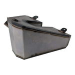 The TC Bros. Horseshoe Oil Tank Kit for 1982-2003 Sportster Hardtail features welded seams, two mounting tabs, and two differently sized circular openings on one side.