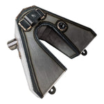 The TC Bros. Horseshoe Oil Tank Kit for 1982-2003 Sportster Hardtail features welded seams, two mounting tabs, and two differently sized circular openings on one side.