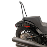 The TC Bros. Kickback Sissy Bar for Harley-Davidson M8 Softail (Chrome) by TC Bros., including mounting brackets and hardware, is shown on a white background.