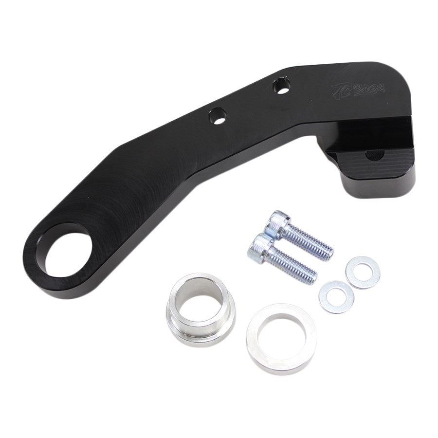 A TC Bros. 2008-2017 Harley Dyna Rear Axial Brembo Bracket 12.6in Rotor with a bolt and nut provides performance improvements such as stopping power when paired with an oversized rotor.
