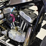 Harley-Davidson motorcycle with a TC Bros. Ripple Black Air Cleaner HD CV Carbs & EFI, featuring a black powdercoat finish.