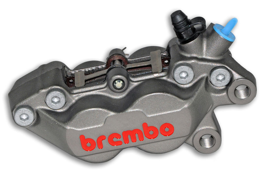 A Brembo P4 Axial Brake Caliper Right Side Silver 4 Piston (red lettering) with the word brembo on it.