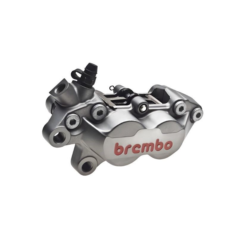 A Brembo P4 Axial brake caliper with the word Brembo on it.