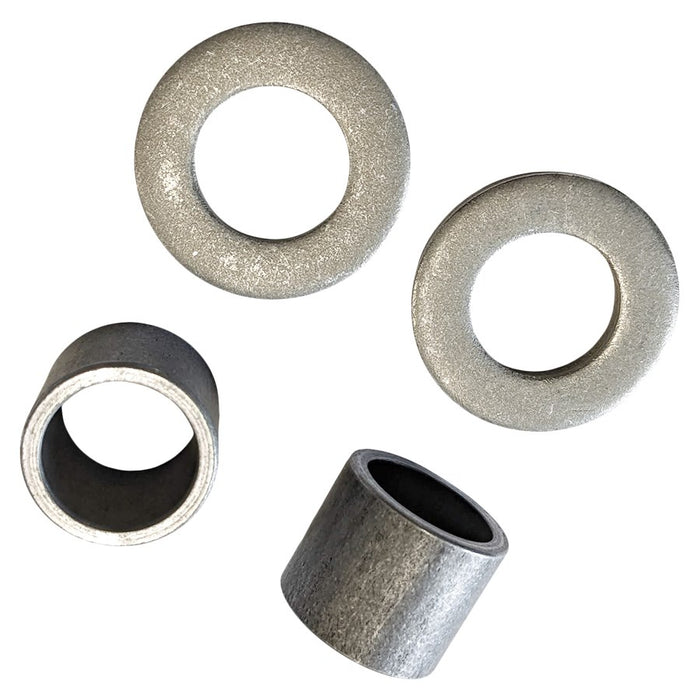 A set of steel washers and TC Bros. 3/4in-1in Axle Bushing Kit for Hardtail 2004 Sportster Models washers on a white background.