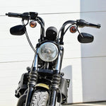 The TC Bros. 1" Speedline Handlebar, by TC Bros., features chrome construction with a wide rise and flat ends, set against a plain white background and inspired by the style of classic Harley handlebars.