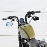 The TC Bros. 1" Speedline Handlebar, by TC Bros., features chrome construction with a wide rise and flat ends, set against a plain white background and inspired by the style of classic Harley handlebars.