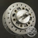 A stainless steel sprocket on a white background, featuring the Hughs HandBuilt Yamaha XS650 Speedometer Eliminator (fits 1975-1983) motorcycle.