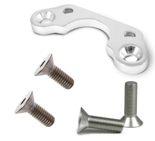 A set of screws and bolts on a white background, perfect for your Moto Iron® Chrome Handlebar Riser Adapter for Springer Front Ends 3.5" centers project.
