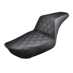 The Saddlemen Step-Up Seat for 2004-2005 Harley-Davidson Dyna features black diamond-patterned stitching, a raised backrest, and smooth side panels for style and comfort.