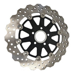 Two TC Bros. motorcycle brake rotors are shown: one is a 12.6" oversized rear floating rotor with a wavy edge for 2000-Up Harley-Davidson wheels, and the other has a smooth circular edge.