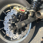 Upgrade your 2000-Up Harley-Davidson with the TC Bros. 11.5" Rear Floating Brake Rotor—featuring a precision-drilled design, black center hub, and top quality from TC Bros.