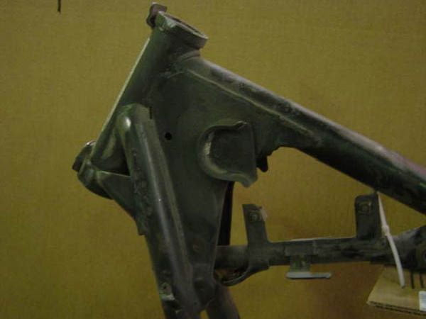 A picture of a TC Bros. XS650 Neck Gussets frame that is sitting on a table.