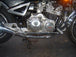 A picture of a TC Bros. Yamaha Maxim XJ750 Forward Controls Kit motorcycle engine parked in a garage.