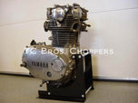 A TC Bros. Yamaha XS650 Engine Stand on display in a room.
